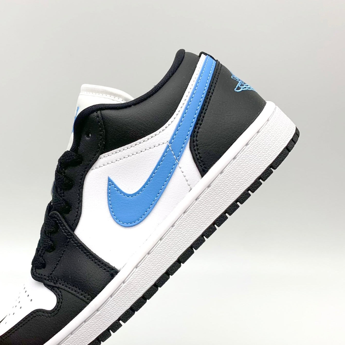 Jordan 1 Low Black University Blue White 